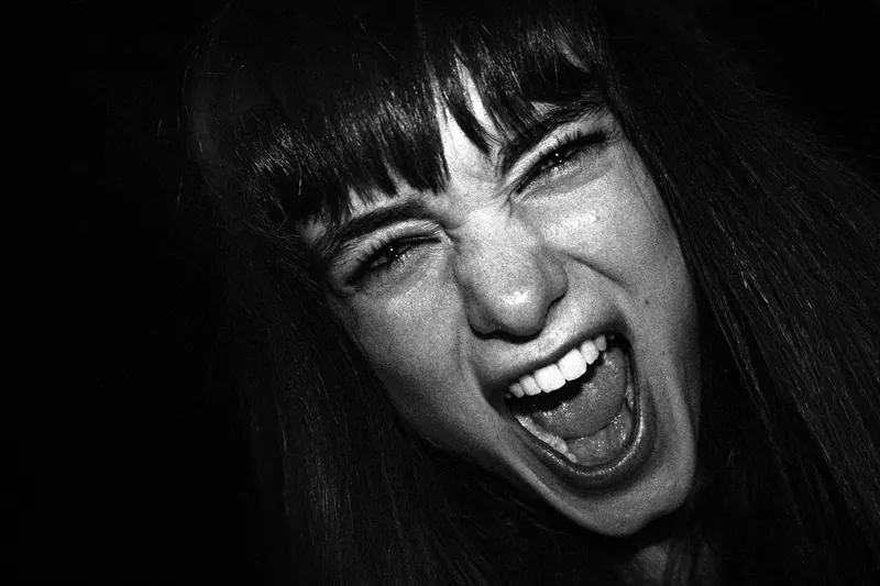 a woman yelling