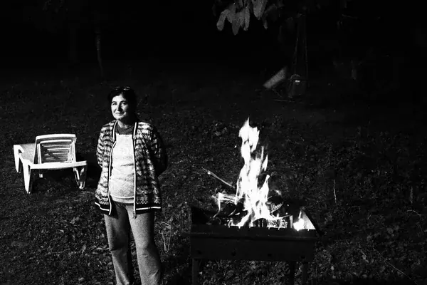 woman by grill