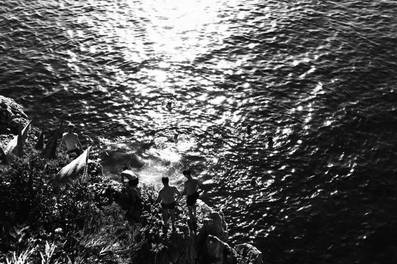 two men above the sea